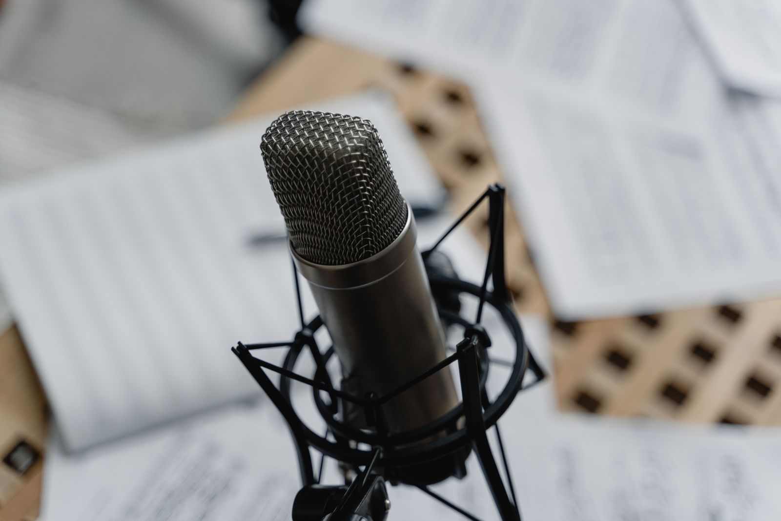 A podcast microphone and mixing board set up for a Hoarfrost Media recording session